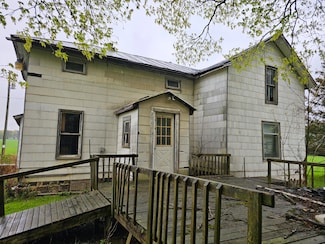 7697 Hogan Rd, Muir, MI 48860