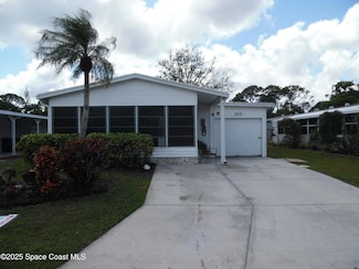 809 Tamarind Dr, Barefoot Bay, FL 32976