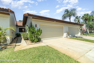303 Parkside Place, Indian Harbour Beach, FL 32937