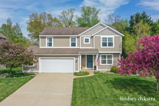 5704 Saddlehorn Dr NE, Belmont, MI 49306
