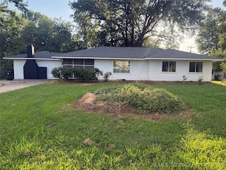 706 S Mission Ln, Okmulgee, OK 74447