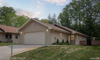 9798 Deer Track Ct, Interlochen, MI 49643