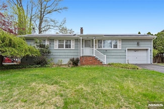 18 Riverside Dr, Pequannock, NJ 07440