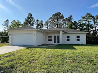 1024 Bagget St E, Lehigh Acres, FL 33974