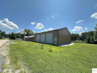 209 N 8th St, Deepwater, MO 64740