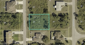 385 Chamonix Ave S, Lehigh Acres, FL 33974