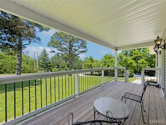 326 State Highway Rd W, MacKs Creek, MO 65786