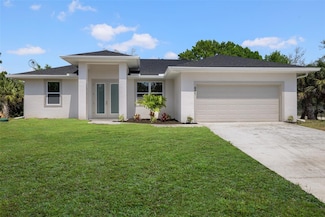 881 Spaulding St E, Lehigh Acres, FL 33974