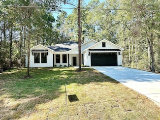 439 Whisperwood Dr, Onalaska, TX 77360