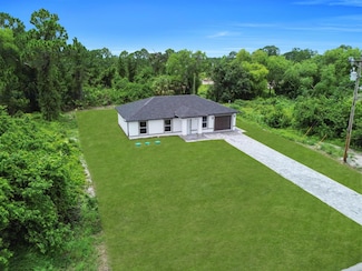 206 Pembroke St, Lehigh Acres, FL 33974