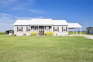 13381 Pousson Rd, Iowa, LA 70647