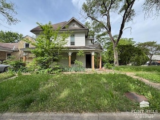 203 S 1st St, Herington, KS 67449
