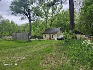 7831 Holton-Duck Lake Rd, Holton, MI 49425