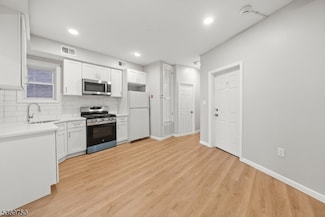 57 Henry St Unit A1, Passaic, NJ 07055