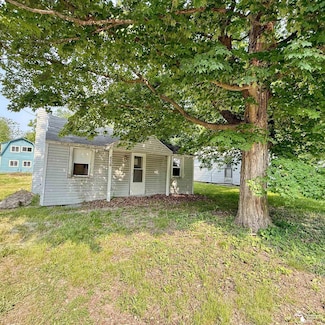 438 Cherry St, Manitou Beach, MI 49253