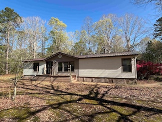 718 E Woodson Lateral Rd, Hensley, AR 72065