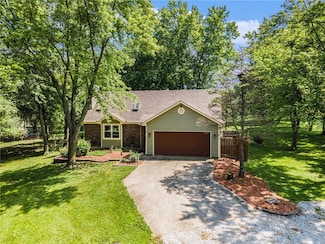 307 E Gore Rd, Raymore, MO 64083