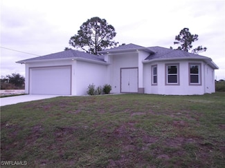 1147 Antonio St E, Lehigh Acres, FL 33974