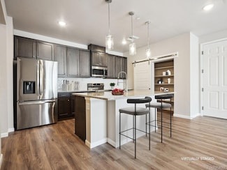 6153 N Ceylon St Unit 303, Denver, CO 80249