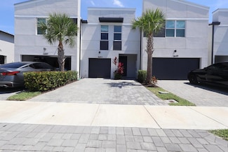 1653 Lindley St, Mangonia Park, FL 33407