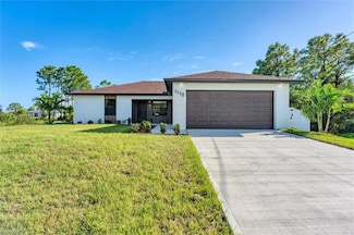 1118 Fontana St E, Lehigh Acres, FL 33974