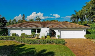 67 Pebble Beach Blvd, Naples, FL 34113