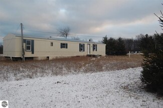 2921 Adam Ln, Grawn, MI 49637