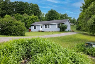 6916 E Forest Hill Dr, Ellsworth, MI 49729