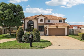15050 E Falcons Lea Dr, Davie, FL 33331