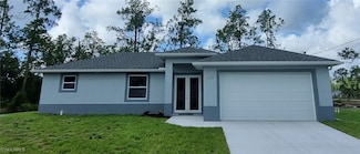 1102 E 15th St, Lehigh Acres, FL 33972