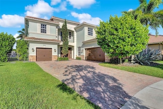 8766 Miralago Way, Parkland, FL 33076