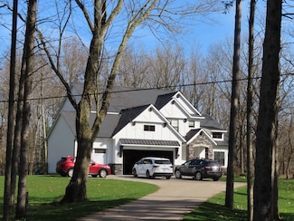 305 Honey Creek Ave SE, Ada, MI 49301