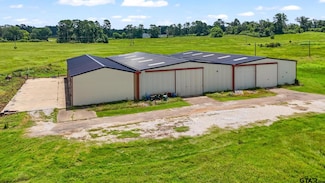 11074 W Highway 64 (42ac+barns), Overton, TX 75684