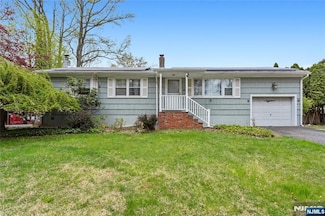 18 Riverside Dr, Pequannock, NJ 07440