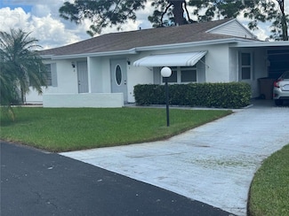 1 Aztec Lily Ln, Lehigh Acres, FL 33936