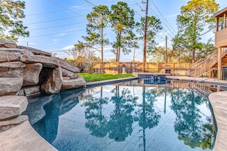 7715 Oakwood Lakes Dr, Houston, TX 77095