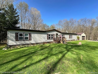 6565 W Coon Lake Rd, Howell, MI 48843