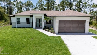 915 Anthony St E, Lehigh Acres, FL 33974