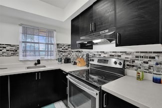 3530 NW 43rd Ave Unit 203, Lauderdale Lakes, FL 33319