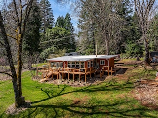 206 Lower Wolf Creek Rd, Wolf Creek, OR 97497