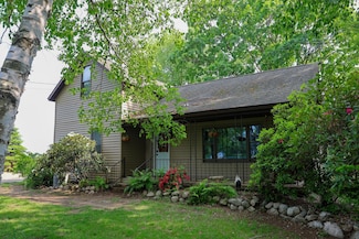 1041 W Arthur Rd, Rothbury, MI 49452