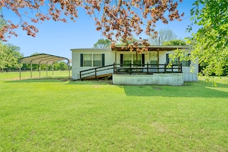 704 County Road 1416, Bogata, TX 75417