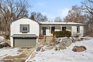91 Carl Dr NE, Ada, MI 49301