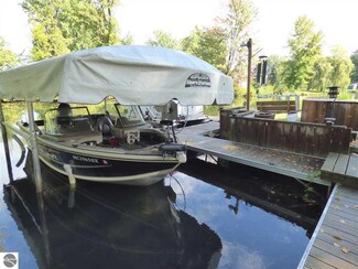 3710 Peninsular Shores Dr, Grawn, MI 49637