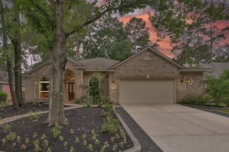 39 E Hobbit Glen Dr, Conroe, TX 77384