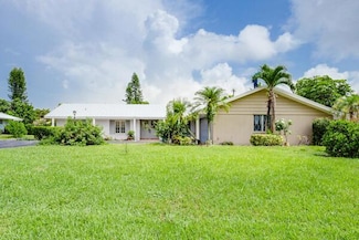 220 N Country Club Dr, Lake Worth, FL 33462