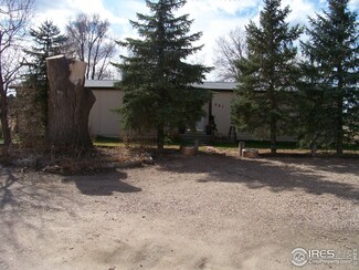 201 Cedar St, Log Lane Village, CO 80705
