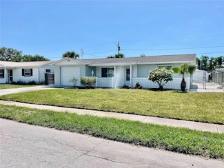 1327 Honor Dr, Holiday, FL 34690