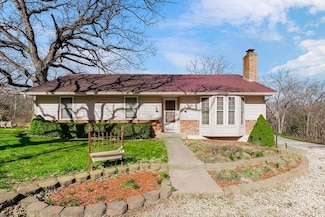 28314 S Bennett Rd, Freeman, MO 64746