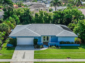 211 W Flamingo Cir, Marco Island, FL 34145